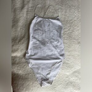 WHITE OPEN-BACK BODYSUIT - SMALL - NEVER WORN!